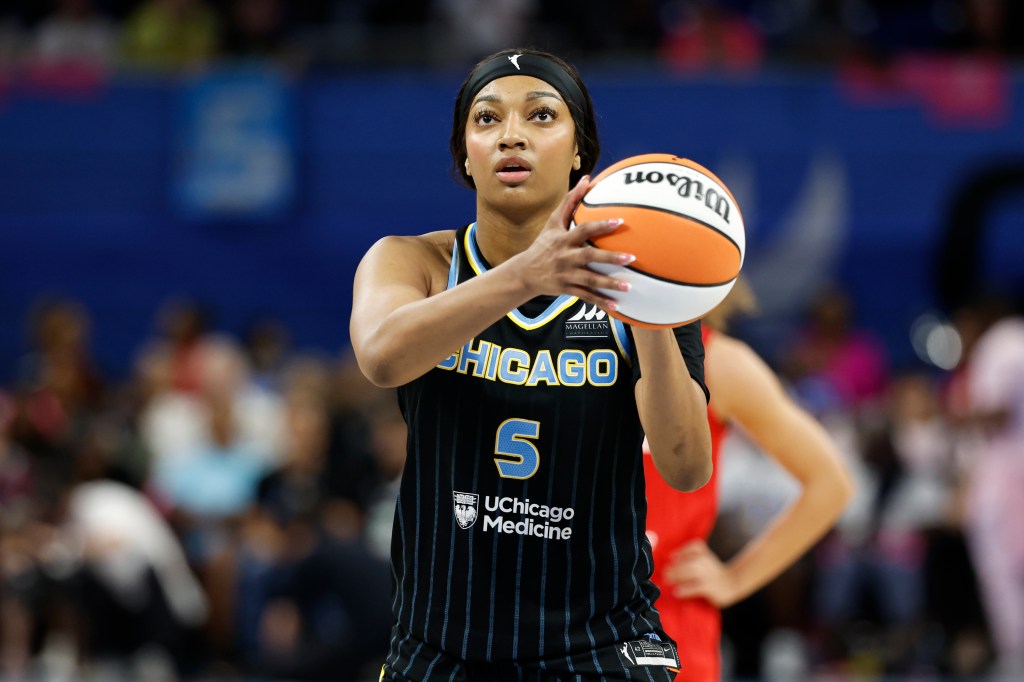 Sky forward Angel Reese (5) shoots a free throw against the Indiana Fever