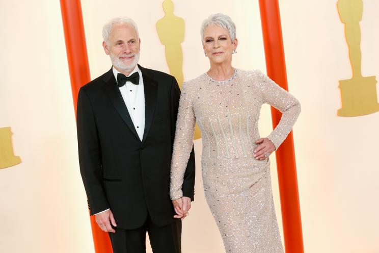 Christopher Guest and Jamie Lee Curtis in formal wear at the 95th Annual Academy Awards in Los Angeles, California on March 12, 2023