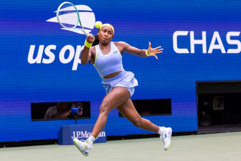 Coco Gauff of the USA returns a ball to Emma Navarro of the USA during their fourth round match at the US Open Tennis Tournament Sunday, Sept. 1, 2024, in Queens, NY.