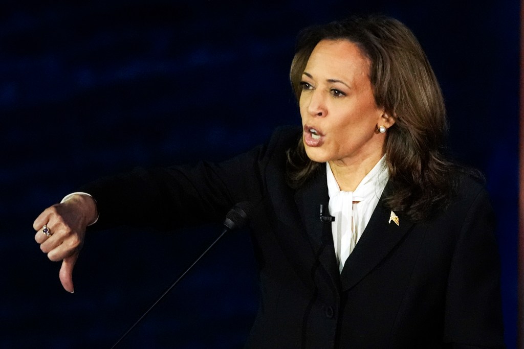 Kamala Harris gestures as she speaks during a presidential debate with Republican presidential nominee former President Donald Trump.