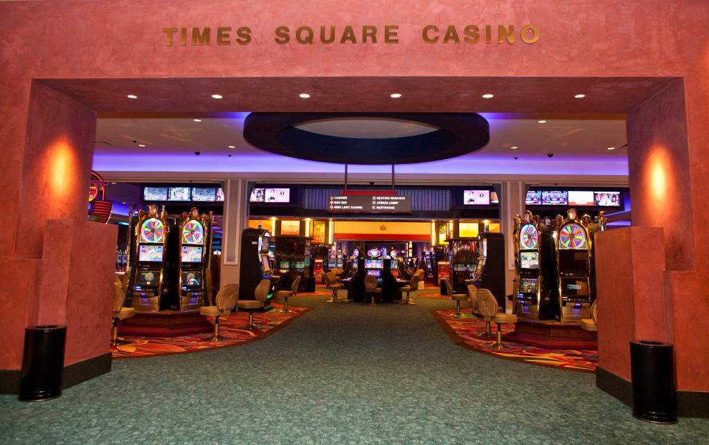 Entrance to the main hall of Genting's new Resorts World Casino, featuring many slot machines, located at the Aqueduct Race Track in Queens, New York.