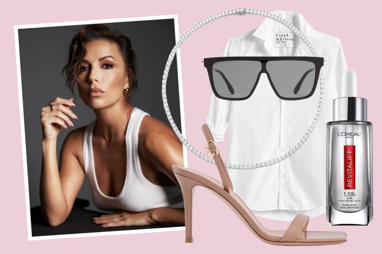 Eva Longoria posing for a picture next to a pair of sunglasses