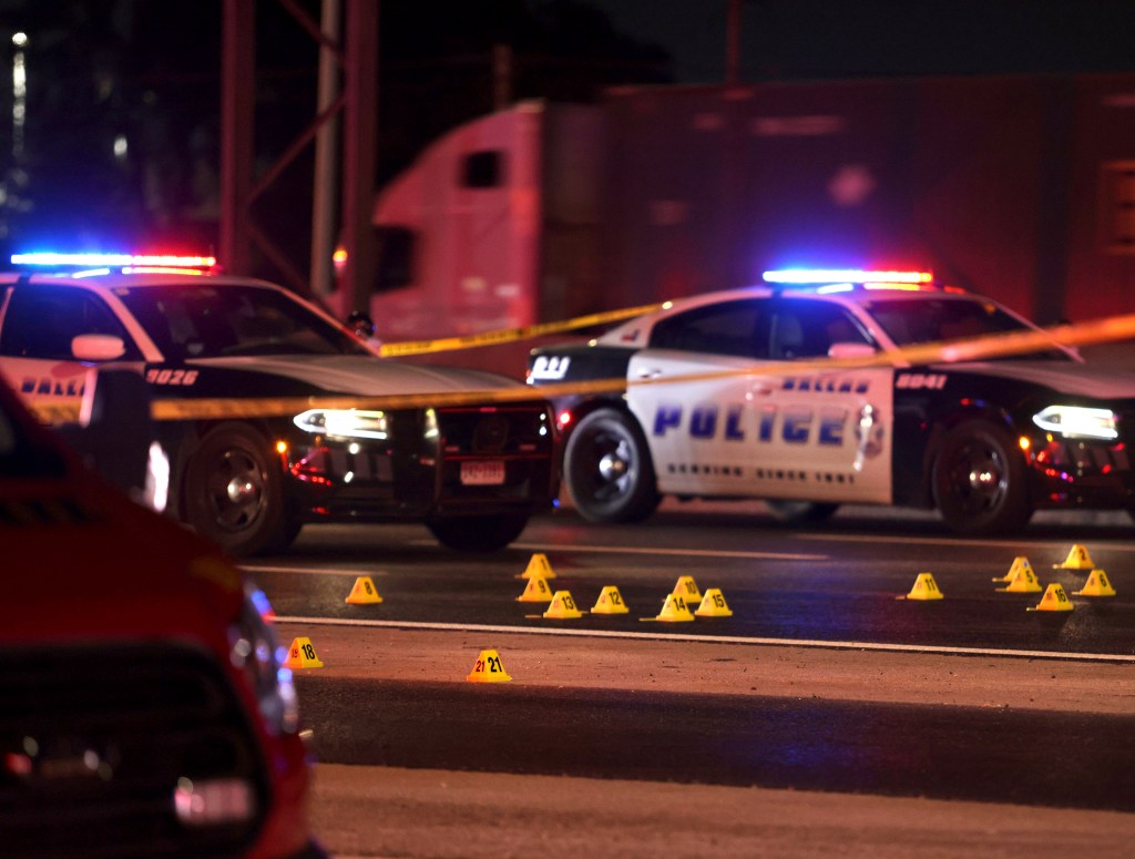 Evidence markers line Interstate 35 following the police involved shooting that killed Cobb-Bey on Aug. 29, 2024.