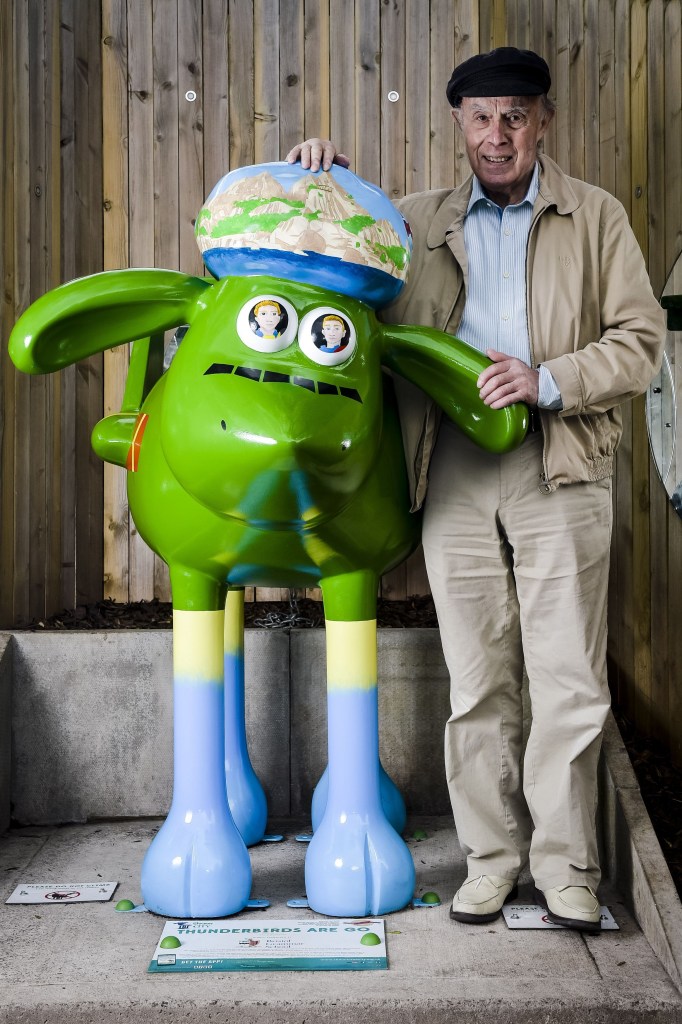 David Graham by a sculpture of Shaun the Sheep titled "Thunderbirds Are Go" on April 8, 2015.