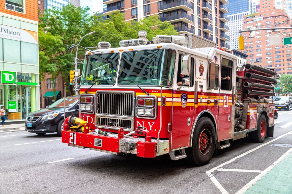 NEW YORK CITY, USA - MARCH 15, 2020: Fire truck responding to a emergency call in Manhattan in New York City, USA