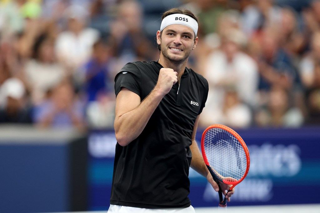 Taylor Fritz pumps his fist during his match with Casper Ruud on Sunday.