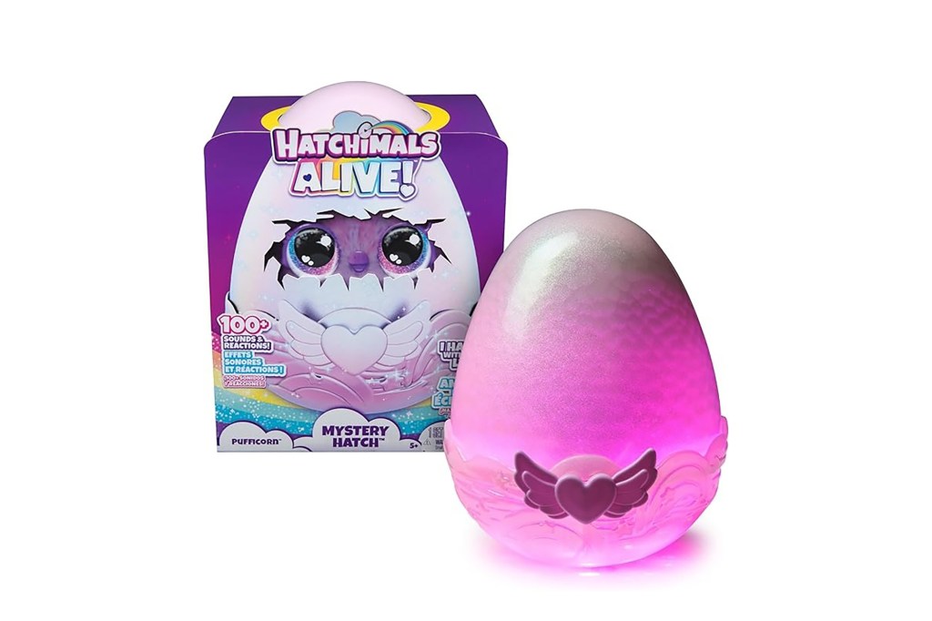 A toy egg glowing with a purple light, labelled as Hatchimals