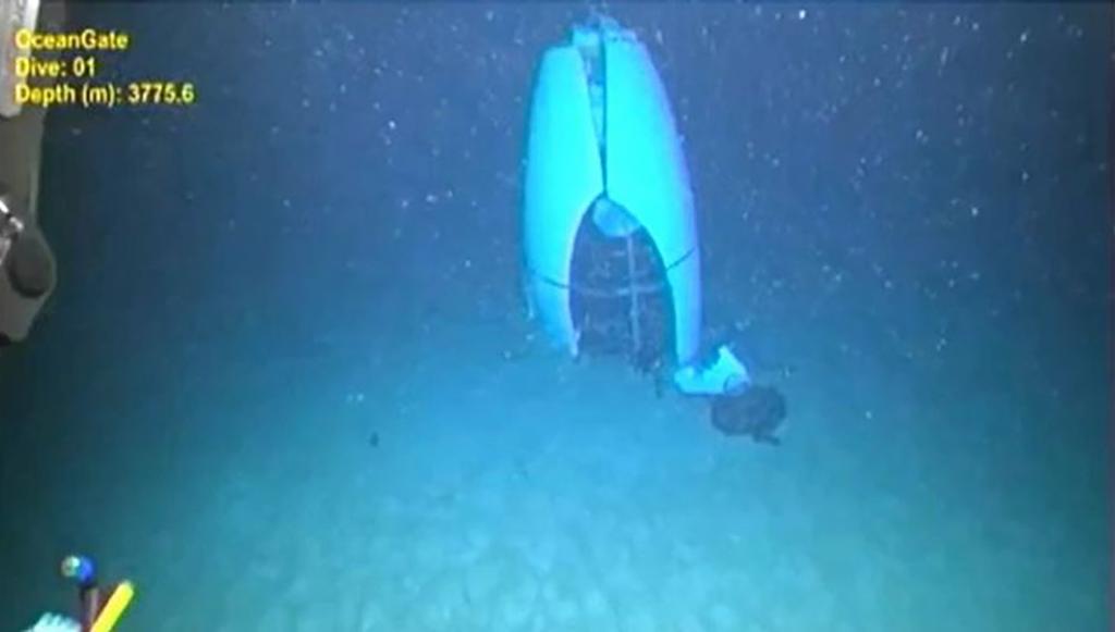 Debris of OceanGate Titan submersible, including its aft tail cone, on the sea floor as captured by a remotely operated vehicle.