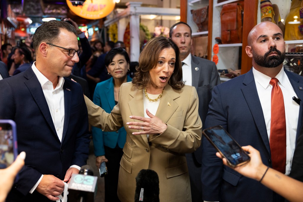 Vice President Kamala Harris and Pennsylvania Governor Josh Shapiro speaking to the press at the Reading Terminal Market in Philadelphia on July 13, 2024