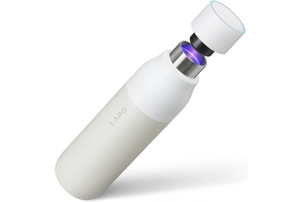 A white bottle with a purple light inside