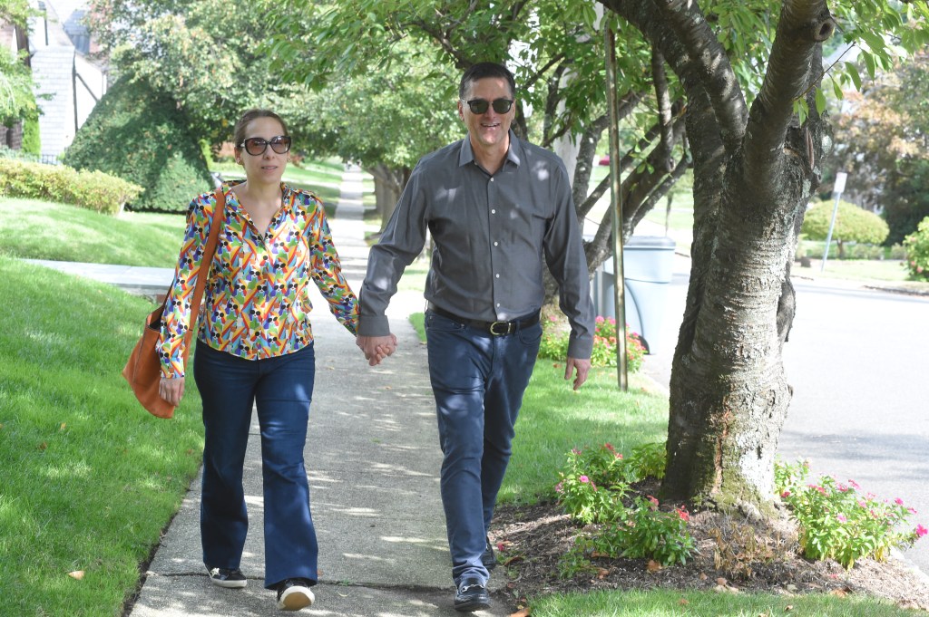 Lawyer Lisa Zornberg and Matt Hoorowitz strolling down there Gaynor Ave in Manhasset.