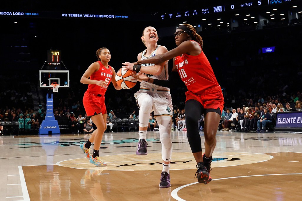 Courtney Vandersloot attempts to shoot during the Liberty's game against the Dream on Sept. 19.