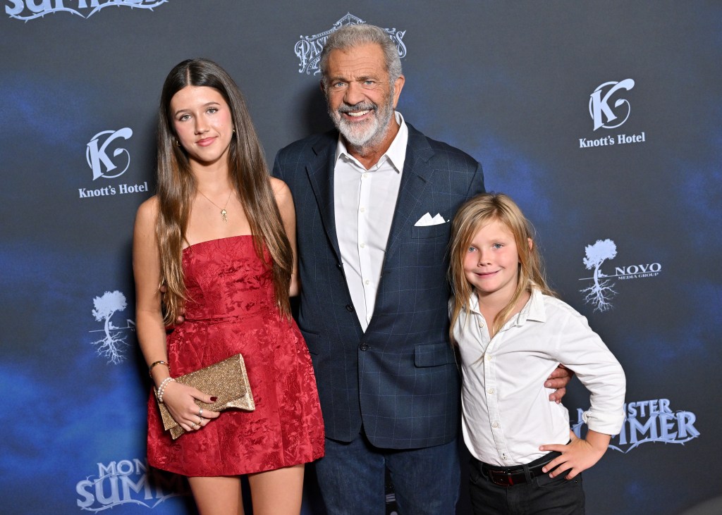 Mel Gibson with his daughter Lucia and son Lars posing for a photo at the Monster Summer premiere in Los Angeles, California.