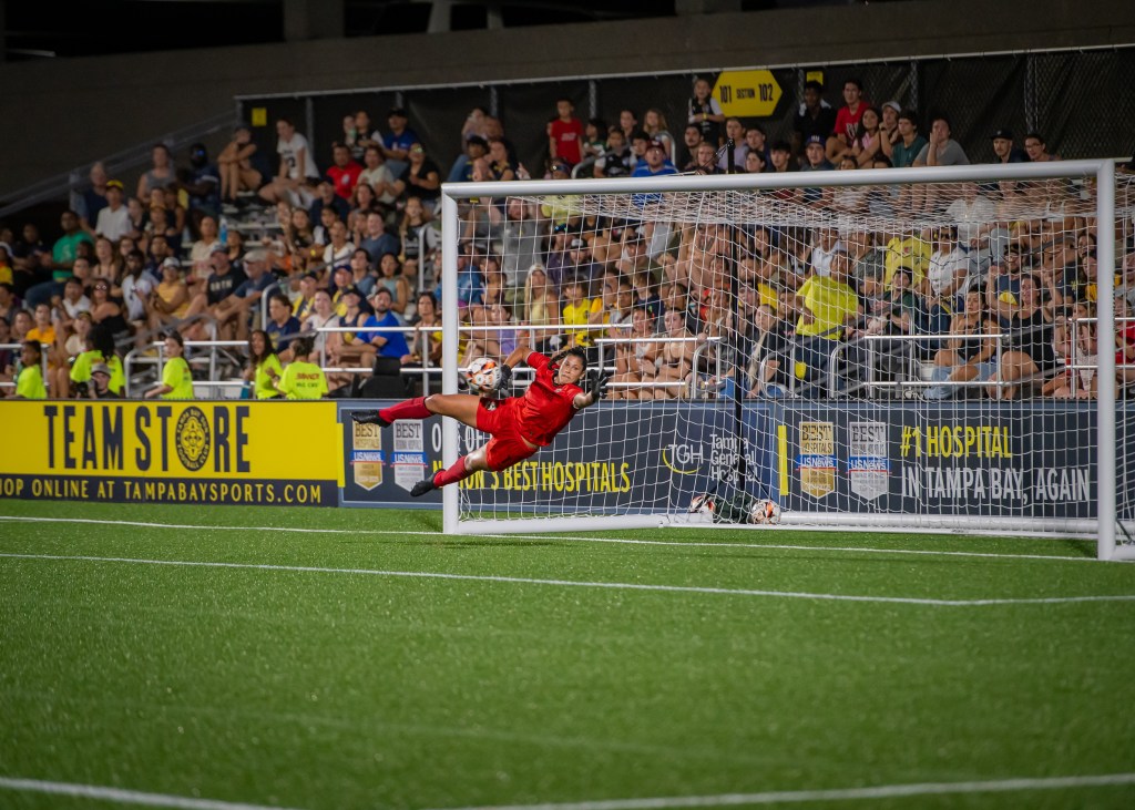 Sydney Martinez (1) makes a save for Brooklyn FC women's team.
