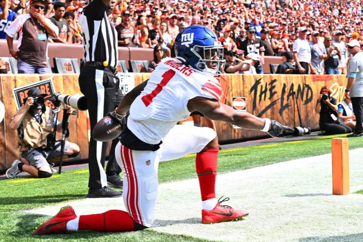 Malik Nabers #1 of the New York Giants celebrating his touchdown reception against the Cleveland Browns at the Cleveland Browns Stadium