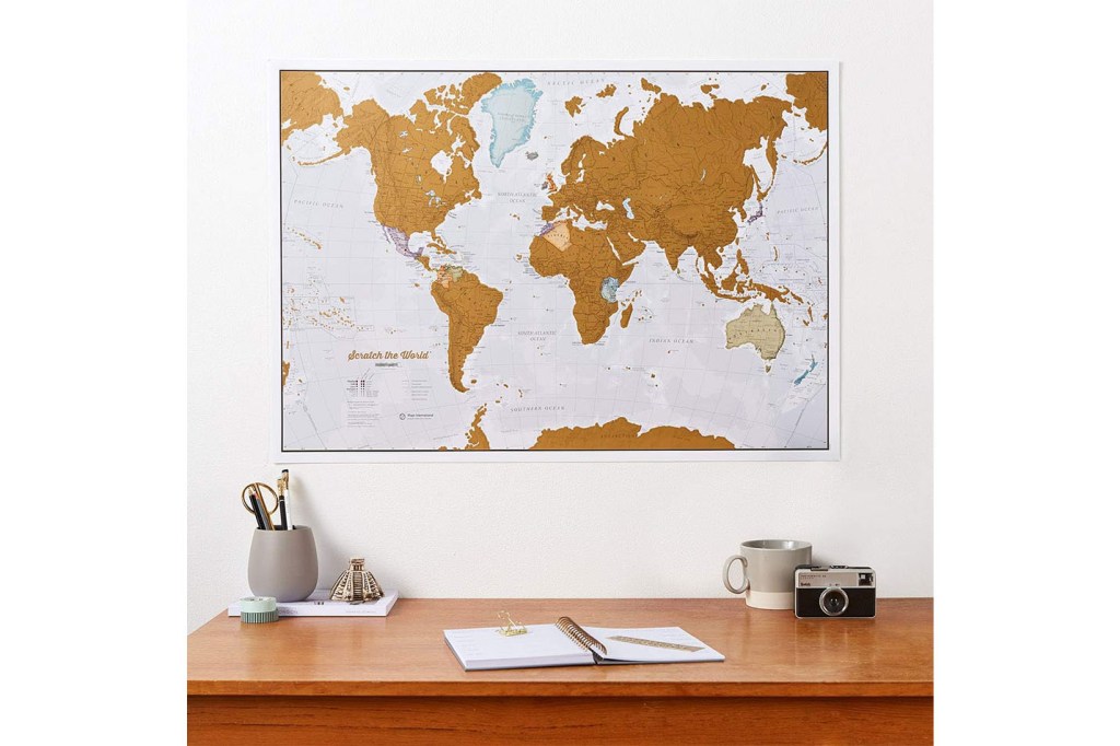 A desk with a map spread out on it