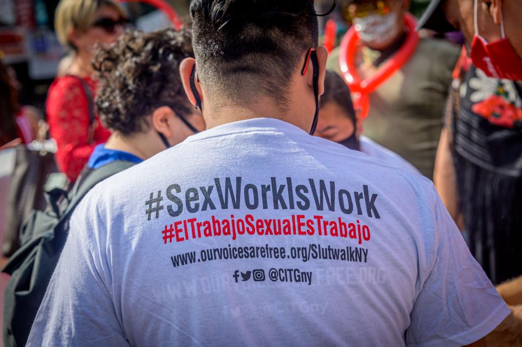 A participant wearing a tshirt with the words Sex Work Is Work. Sex workers and their allies marched through Jackson Heights and Corona for the Third Annual Slut Walk (Marcha De Las Putas) in Queens.