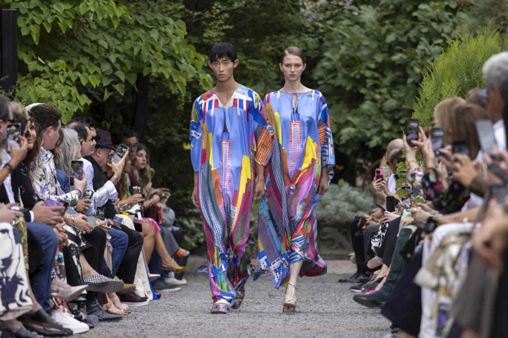 Models showcasing Libertine fashion designs on a runway during New York Fashion Week at Elizabeth Street Garden in New York, USA