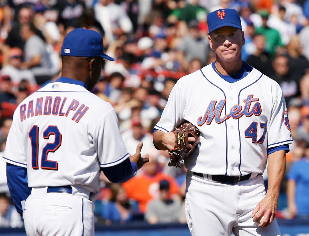 New York Mets starting pitcher Tom Glavine is pulled from the game by manager Willie Randolph after giving up 5 runs in the first inning against the Florida Marlins at Shea Stadium in New York City on September 30, 2007.