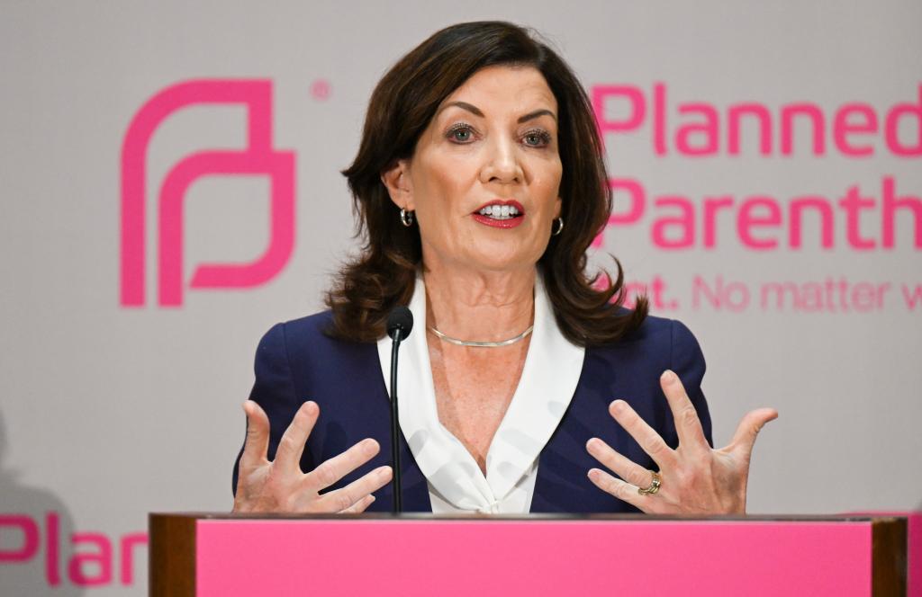 New York State Governor Kathy Hochul speaking at a podium during a Planned Parenthood Day of Action rally at the state Capitol in Albany, N.Y., Tuesday, Jan. 24, 2023