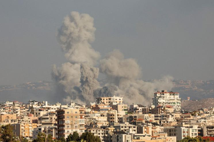 Smokes rise, amid ongoing cross-border hostilities between Hezbollah and Israeli forces, in Tyre, southern Lebanon September 23, 2024.