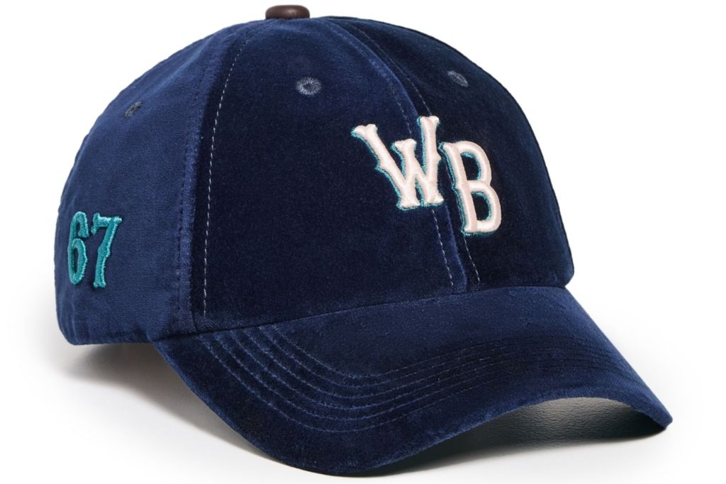 A blue hat with white letters on it