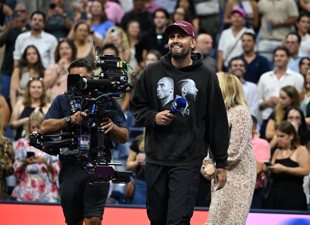 Kyrgios is seen doing an interview with Carlos Alcaraz after his match against Li Tu on Arthur Ashe Stadium at the USTA Billie Jean King National Tennis Center on August 27, 2024.