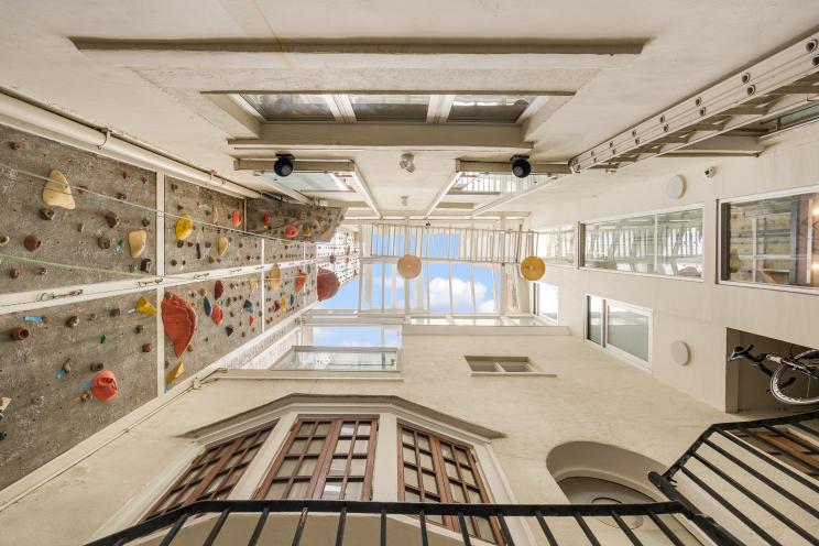 Architect Adam Kushner's $20 million Greenwich Village townhouse is a one-of-a-kind property, featuring what is believed to be the tallest private rock-climbing wall in the world.