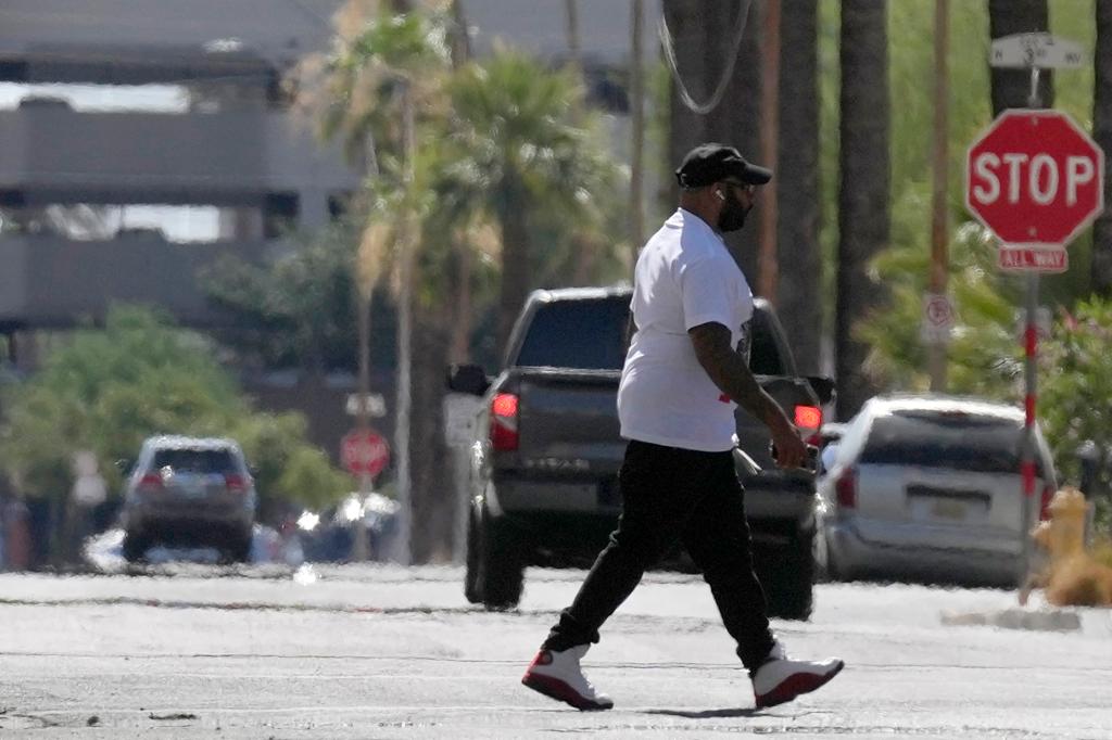 Heat waves rising from the pavement during a 104 degree day in Phoenix on June 17, 2024.