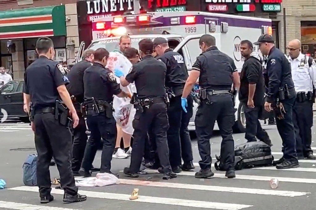 A brute randomly bashed an elderly woman in the face with a ceramic plate – and then attacked two NYPD cops who tried to cuff him in Manhattan Tuesday, authorities and sources said.