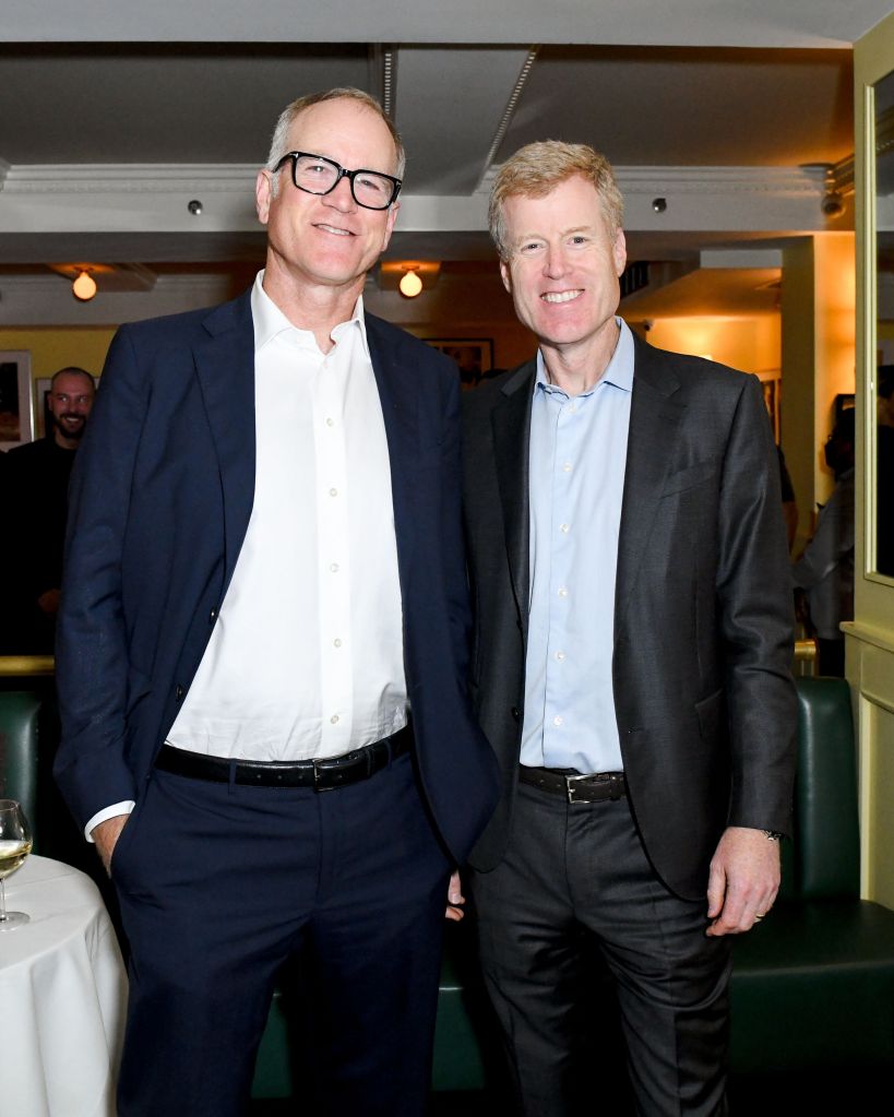 Pete and Erik Nordstrom standing together, smiling at the Nordstrom NYFW Dinner in NYC.