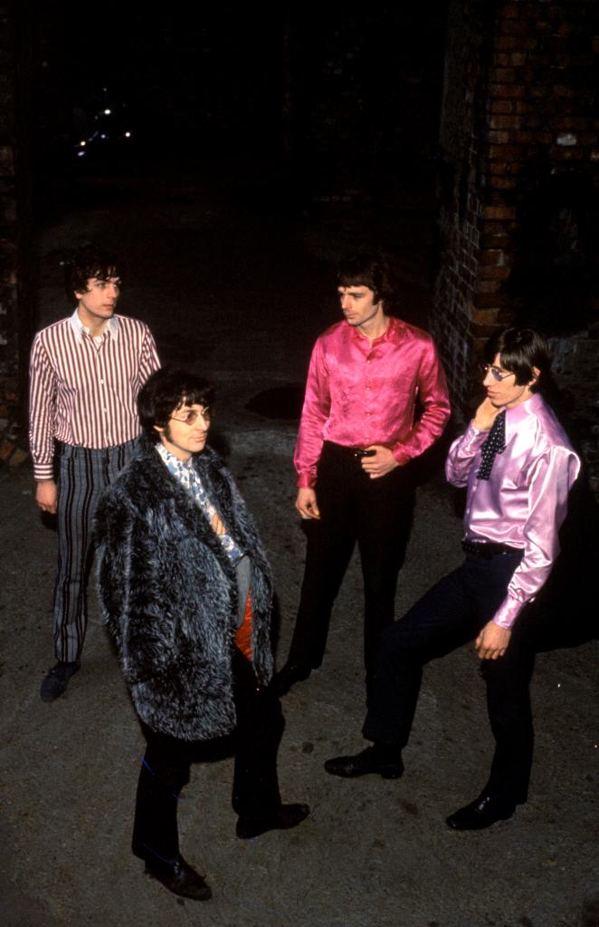 1960's Pink Floyd members Roger Waters, Syd Barrett, Richard Wright standing outside.