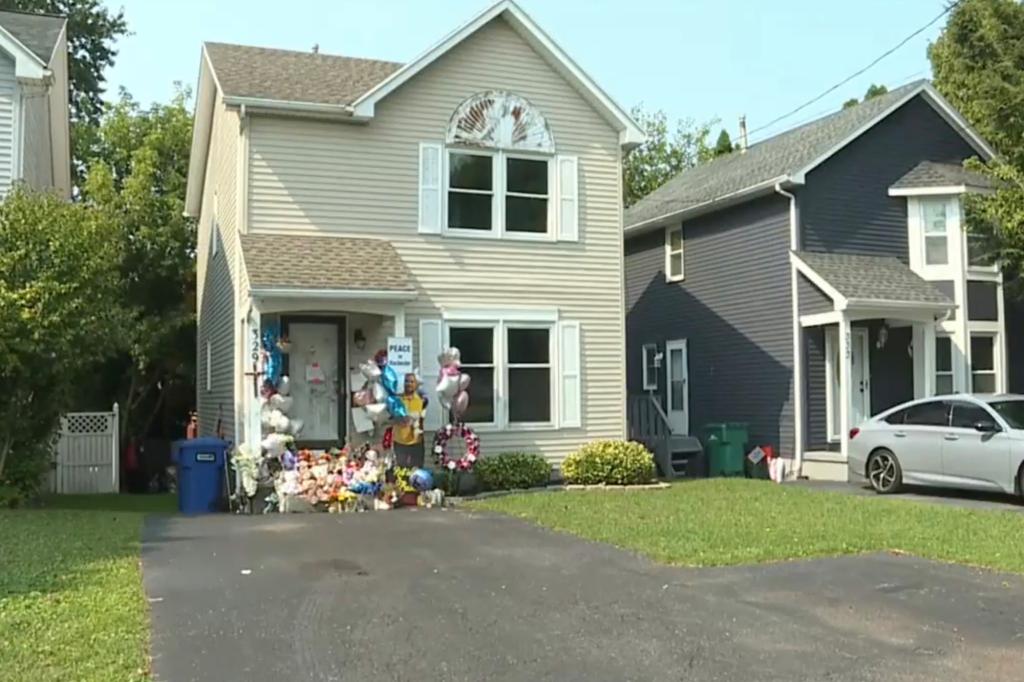 A makeshift vigil was set on the front porch of the Moreno family's home on Knapp Avenue in Irondequoit in the past two weeks, complete with stuffed animals and photos of the victims.