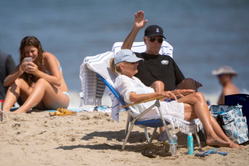 Joe Biden at the beach waving.