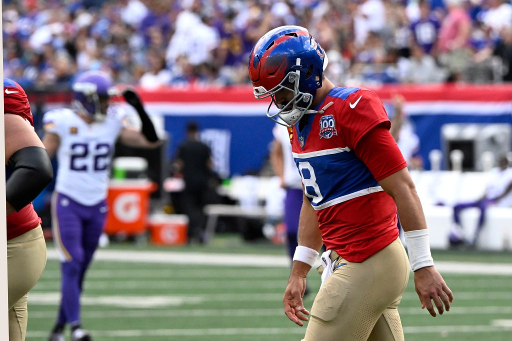 Daniel Jones (8) reacts after throwing a pick six during the third quarter of the Giants/Minnesota Vikings game at MetLife Stadium in East Rutherford, N.J. 