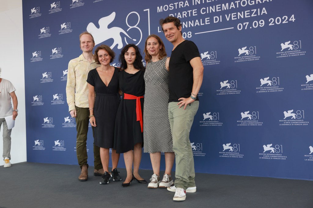 Roland Schlimme, Sally Blake, Director Anastasia Trofimova, Cornelia Principe and Philippe Levasseur posing at the 'Russians At War' photocall during the 81st Venice International Film Festival