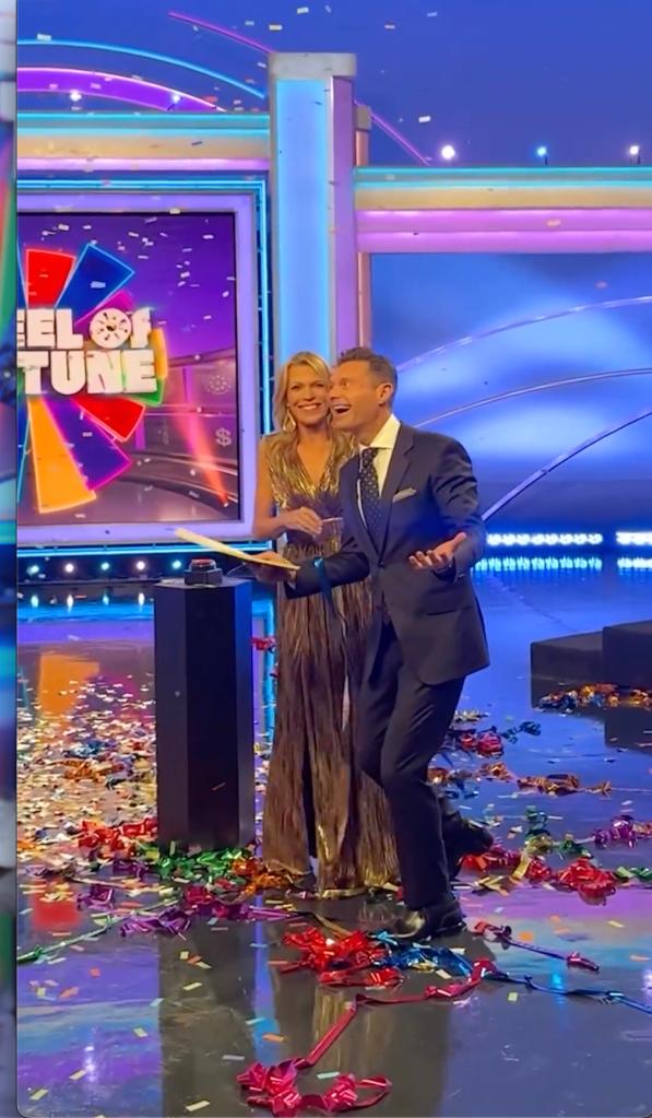 Vanna White and Ryan Seacrest on "Wheel of Fortune"