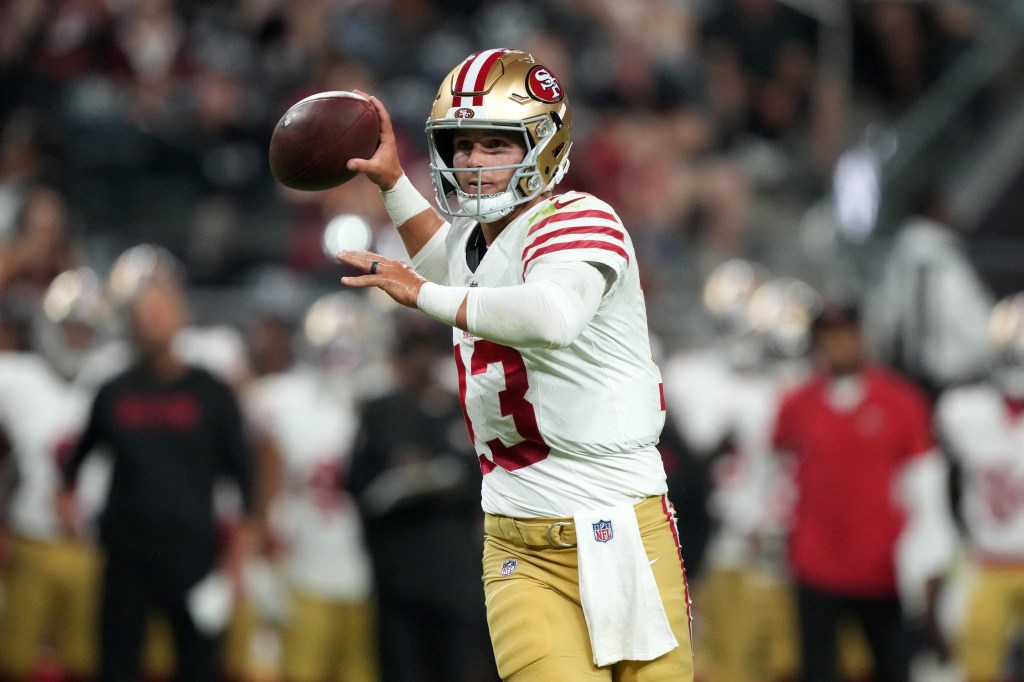 49ers quarterback Brock Purdy (13) throws the ball against the Las Vegas Raiders