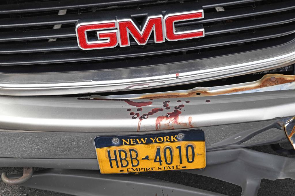 Blood on a car at the scene of the slashings.