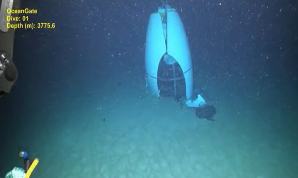 Debris of OceanGate Titan submersible, including its aft tail cone, on the sea floor as captured by a remotely operated vehicle.