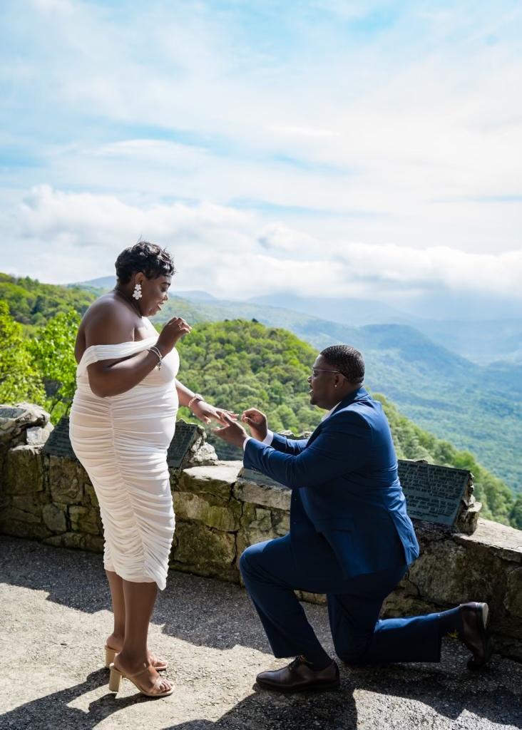 Chasmon Wilson proposing to his girlfriend Kayla Pressley by kneeling on one knee in South Carolina.