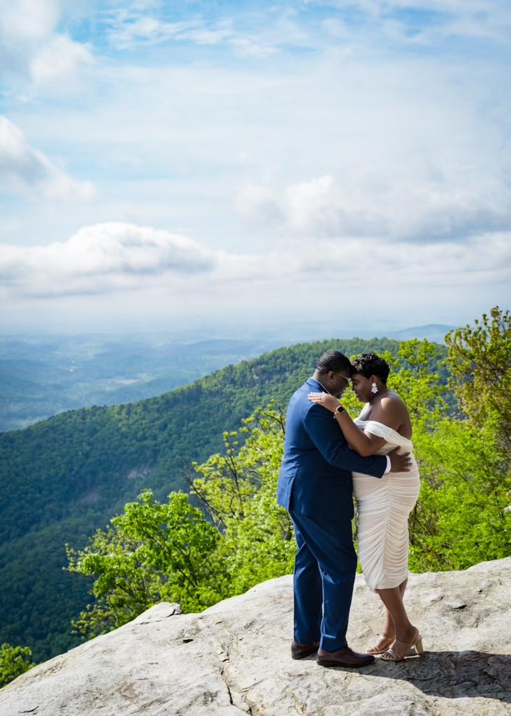 Chasmon Wilson hugging his girlfriend Kayla Pressley after proposing to her, with trees in the background in South Carolina.