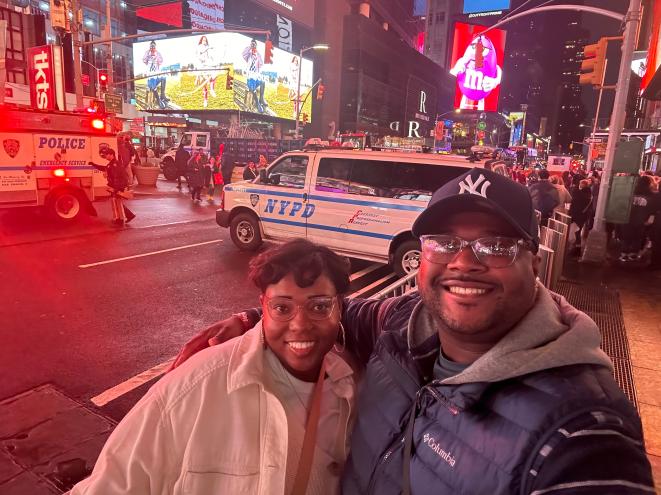 Chasmon Wilson and Kayla Pressley taking a selfie in Times Square, NYC.