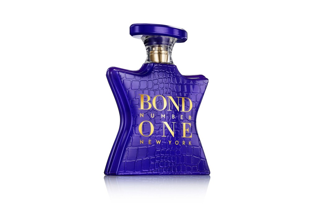 A purple bottle of perfume.