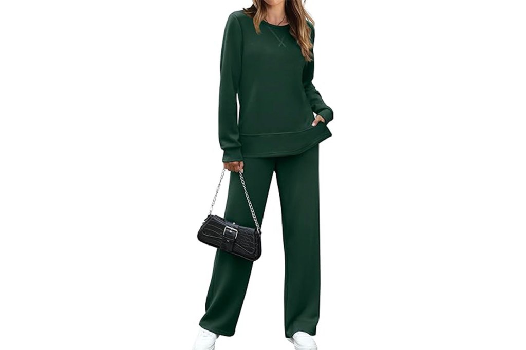 A woman wearing a green sweatsuit