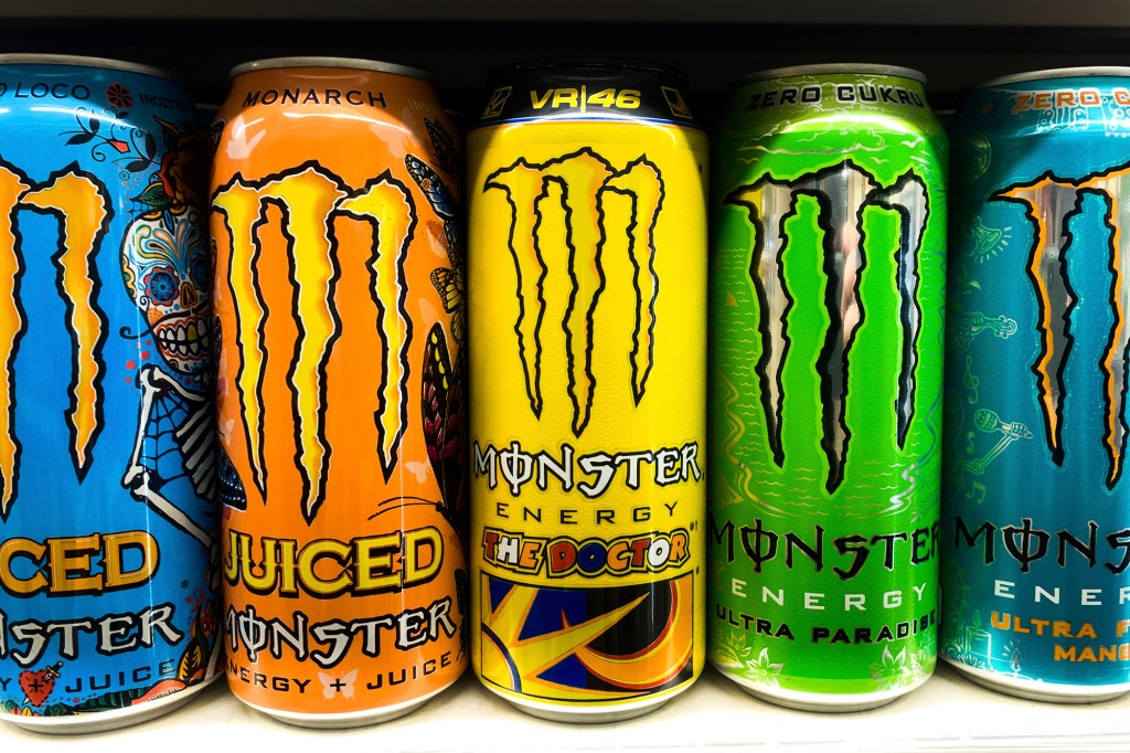 Group of Monster Energy drinks cans displayed in a shop in Krakow, Poland on December 31, 2021