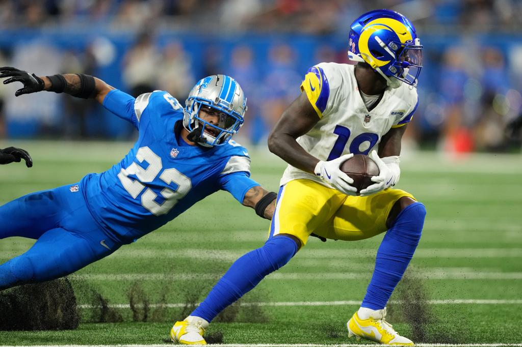 Tyler Johnson #18 of the Los Angeles Rams makes a catch in front of Carlton Davis III #23 of the Detroit Lions