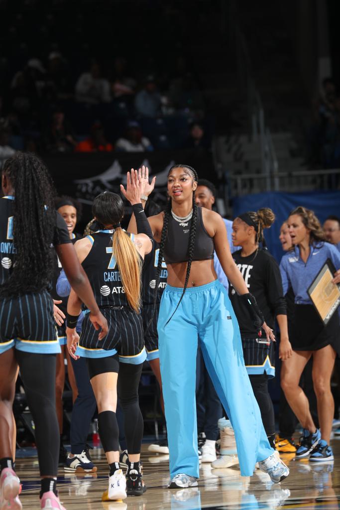 Angel Reese #5 of the Chicago Sky high fives Chennedy Carter #7 during the game on September 8, 2024 at the Wintrust Arena in Chicago, IL. 