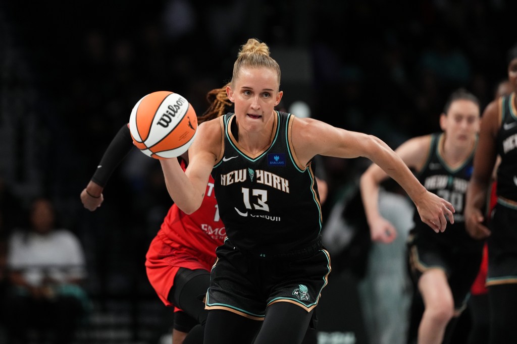 Leonie Fiebich #13 of the New York Liberty dribbles the ball during the game against the Atlanta Dream