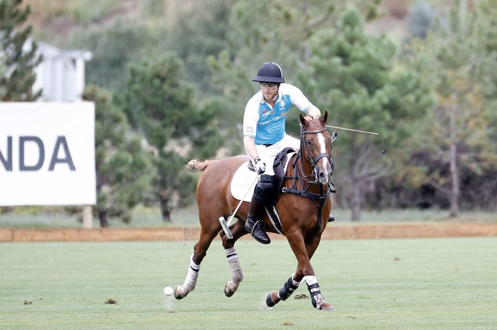 Prince Harry playing polo at the Sentebale ISPS Handa Polo Cup in Aspen, raising funds for vulnerable children in Southern Africa.